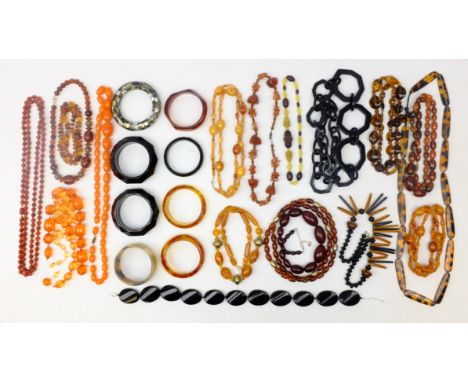 Large collection of amber coloured necklaces and other vintage jewellery   Condition Report   Click here for further images, 