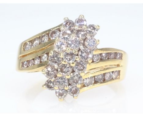 14ct gold diamond cluster cross-over ring stamped 14KP diamonds approx 1 carat   Condition Report  Size L-M approx 3.8gm  Cli