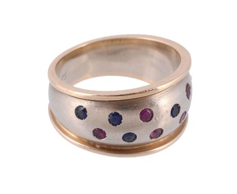  A sapphire and ruby ring,   the band set with circular shaped sapphires and rubies, stamped 14K, finger size Q 1/2, 12.1g 