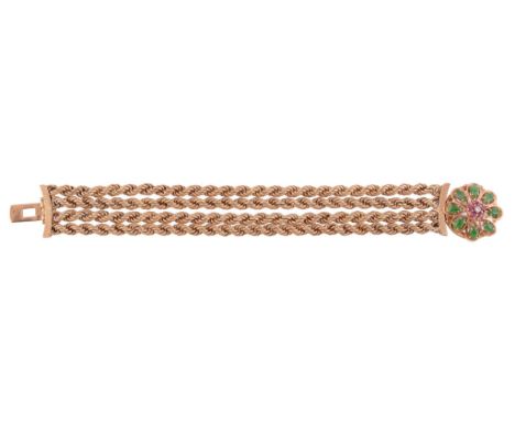  A 14 carat gold, jadeite, ruby and diamond bracelet,   composed of four ropetwist strands, to a circular shaped clasp set wi