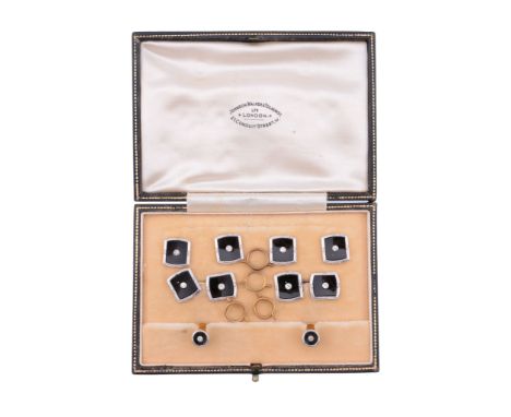  A diamond and onyx dress set,   circa 1930, the cufflinks with onyx panels each centred with a millegrain collet set diamond