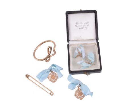  A 9 carat gold child's bangle,   the polished bangle formed as the letter L, stamped 375 with full London hallmarks,  4.3cm 