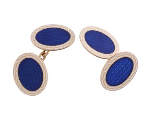  A pair of blue enamel double sided cufflinks,   the  oval panels with a central oval panel of blue guilloche enamel, within 