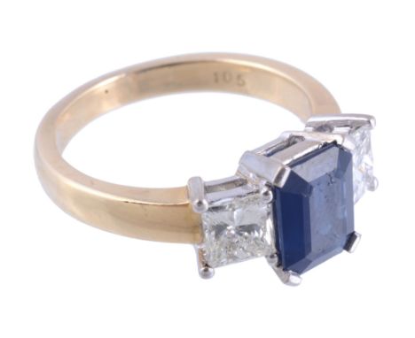  A sapphire and diamond ring,   the central rectangular shaped sapphire in a four claw setting, flanked by two princess cut d