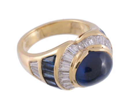  A sapphire and diamond bombe ring,   the central oval cabochon sapphire collet set within a surround of baguette cut diamond