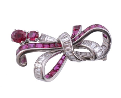  A 1950s ruby and diamond bow brooch,   the stylised bow set with calibre cut rubies and graduated baguette cut diamonds, app