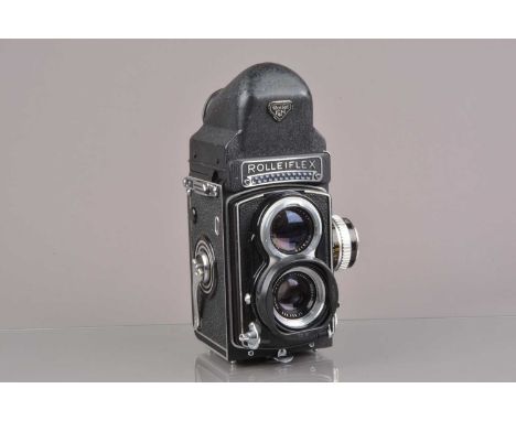 A Rolleiflex T TLR Camera,  model 3, white face, serial no T 2316642, shutter working, meter responsive, self-timer working, 