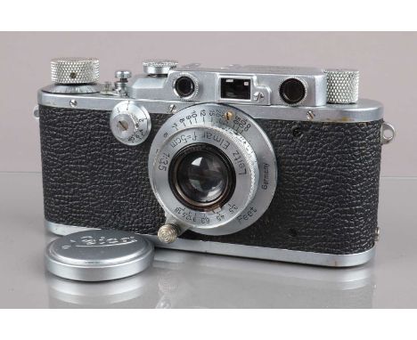 A Leitz Wetzlar Leica IIIa Rangefinder Camera, serial no 174674, 1935, shutter working, rangefinder working, body G, brassing