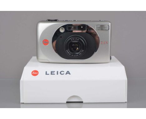 A Leica Z2X Compact Camera, powers up, shutter working, flash working, self-timer working, data back functions, body G-VG, wi