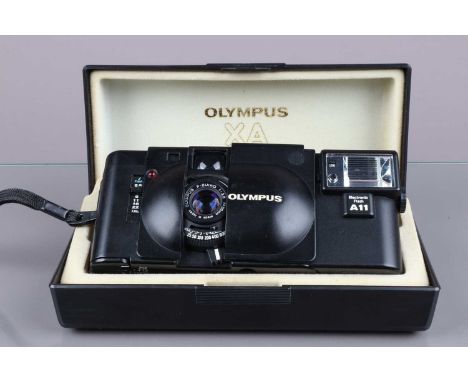 An Olympus XA Compact Camera, shutter working, meter and shutter speed responsive, self-timer working, rangefinder working, b