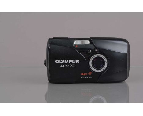 An Olympus mju II Compact Camera, powers up, shutter working, flash working, self-timer working, body G-VG, elements G-VG, wi