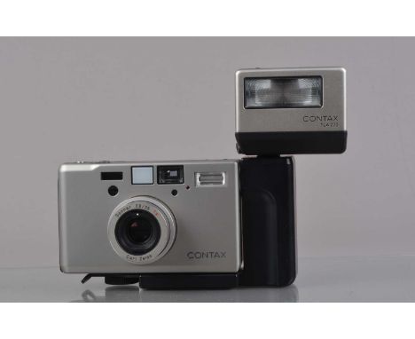 A Contax T3 Compact Camera, powers up, shutter working, flash working, appears to function as should, body VG, with Carl Zeis