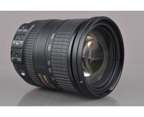 A Nikon AF-S DX VR 18-200mm f/3.5-5.6G IF ED Lens, serial no 2932742, auto focus working, barrel G, light wear, elements VG, 