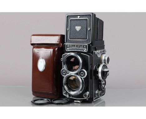 A Rolleiflex 2.8F TLR Camera, serial no 241145, shutter sluggish, meter responsive, body G, light wear to back, with Carl Zei
