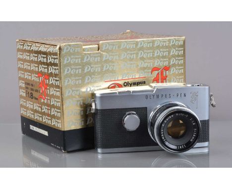 An Olympus Pen F Half Frame Camera, serial no 131091, shutter working, body G, light wear, with F Zuiko 38mm f/1.8 lens, barr