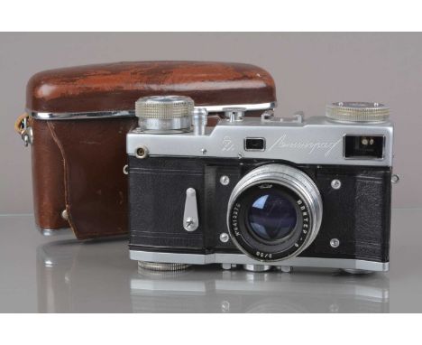 A GOMZ Leningrad Rangerfinder Camera, four screw, latin Leningrad with GOMZ logo,  circa 1964, serial no 630997, spring drive