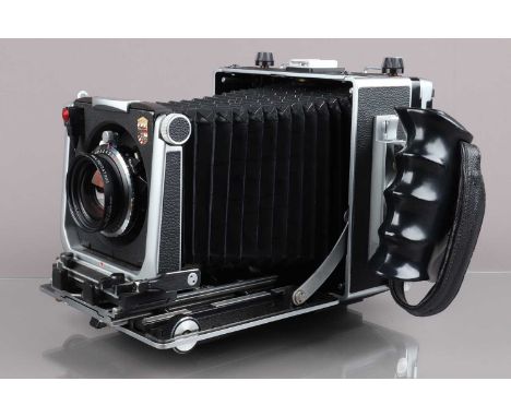 SALEROOM ANNOUNCEMENT - CRACKING ON BELLOWS IS A DESIGN FEATURE, NOT A FLAW.A Linhof Master Technika 4 x 5in Camera, serial n