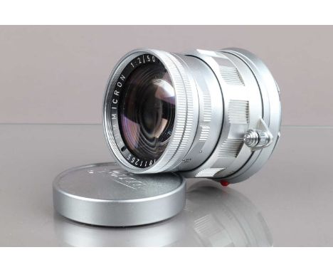 A Leitz Wetzlar 50mm f/2 Summicron M Lens, serial no 1811265, 1960, second version, barrel G-VG, light wear, elements G, some