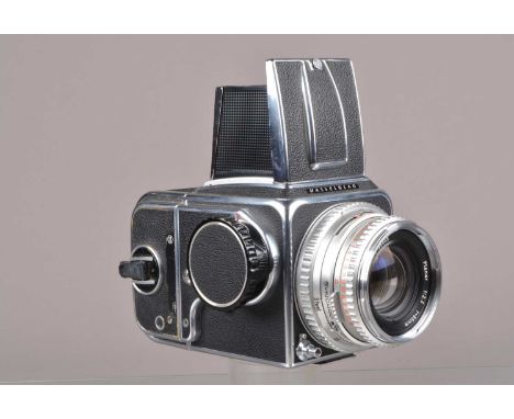 A Hasselblad 500C Camera, serial no UH 125736, body G-VG, shutter working, with Carl Zeiss Planar 80mm f/2.3 lens, serial no 