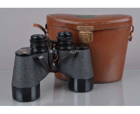 A Pair of Carl Zeiss 10x50 Binoculars, made in Germany, serial no 515985, body G, light wear, elements G, with caps, in Carl 