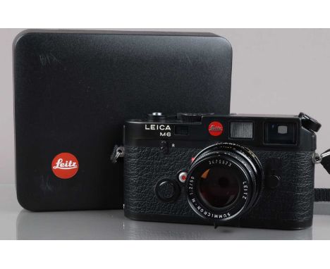 A Leitz Wetzlar Leica M6 Camera, black, serial no 1709202, 1986, shutter working, meter working, viewfinder clear, rangefinde