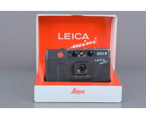 A Leica Mini Compact Camera, powers up, shutter working, flash working, self-timer working, data back appears not to function