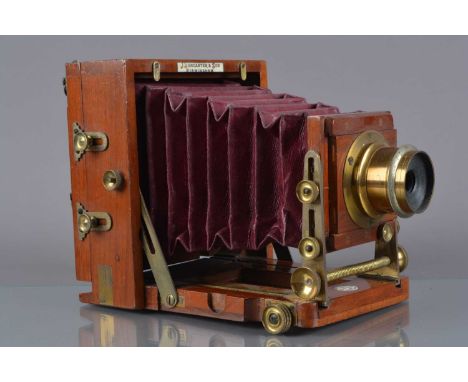 A mahogany and brass Lancaster 'The 1893 Instantograph Patent' Quarter-Plate Field Camera,  brass-bound bottom corners to rea