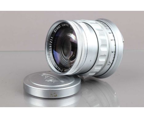 A Leitz Wetzlar 5cm f/2 Summicron M Lens, serial no 1597211, 1958, second version, barrel G-VG, light wear, elements G-VG, wi