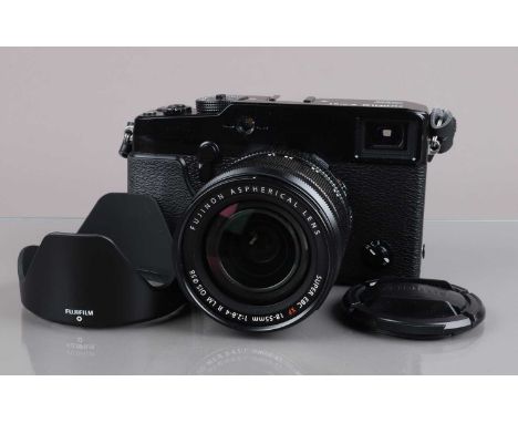 A Fujifilm X-Pro 1 Digital Camera, serial no 22MO3550, shutter working, appears to function as should, body G-VG, with Fujino