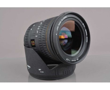 A Sigma EX 28-70mm f/2.8D Aspherical Lens, Nikon AF mount, auto focus working, barrel VG, elements G-VG, with front/rear caps