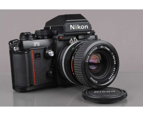 A Nikon F3 HP SLR Camera, serial no 1991795, shutter working, HP finder working, self-timer working, body G-VG, with Zoom Nik