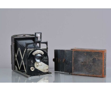 A Newman and Guardia New Ideal Sibyl 3¼ x 4¼'' Folding Plate Camera, serial no 601444, with rising front, shutter sluggish, b