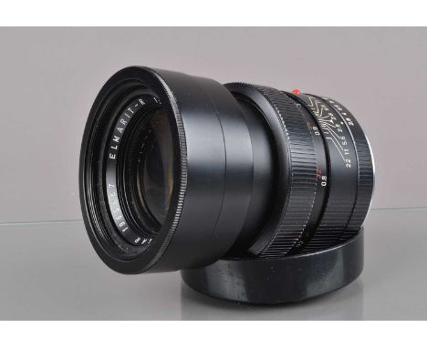 A Leitz Wetzlar 90mm f/2.8 Elmarit-R Lens, serial no 1965867, 1962, 1 cam, barrel G, some paint wear to grip, elements G-VG, 