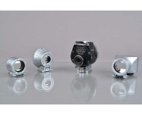 Four Leitz Finders, SGVOO 9cm finder, in maker's box, SBOOI 50mm finder, in case, SBLOO 3.5cm finder and VIOOH round type fin