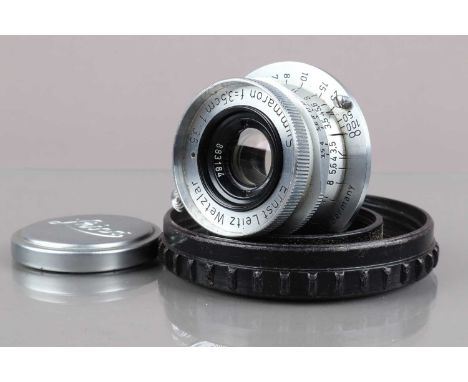 A Leitz Wetzlar 3.5cm f/3.5 Summaron Lens, serial no 883184, 1951, barrel G, light wear, elements F, clouding/fungus, with fr