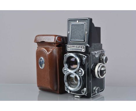 A Rolleiflex 2.8E TLR Camera, serial no 1629683, shutter sluggish on one second, meter responsive, self-timer working, body G