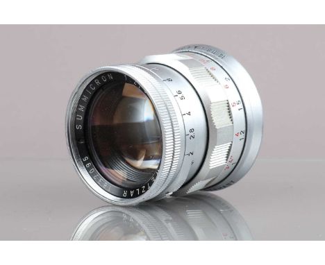 A Leitz Wetzlar 50mm f/2  Summicron M Lens, serial no 1837095, 1961, second version, barrel G, light wear, some scratches to 