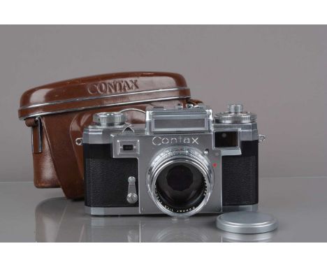 A Zeiss Ikon Contax IIIa Rangefinder camera, black dial, serial no A61604, shutter working, meter unresponsive, rangefinder f