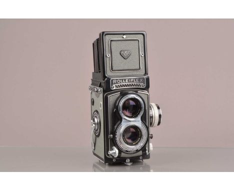 A Rolleiflex T TLR Camera,  model I, grey, serial no 2136440, shutter working, meter responsive, body G-VG, with Carl Zeiss 7