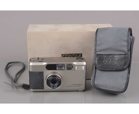 A Contax T2 Titan Silver Compact Camera, powers up, shutter working, meter responsive, flash working, self-timer working, app