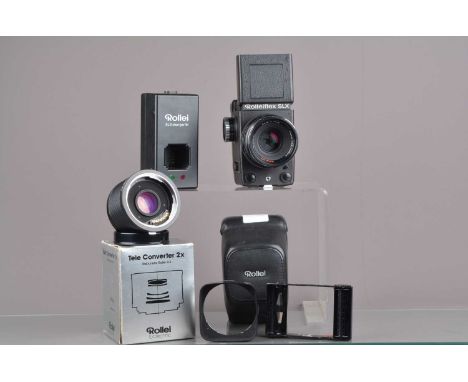 A Rolleiflex SLX Camera, serial no 564106002, shutter working, body G, some light wear, with Rollei HFT 80mm f/2.8 Planar len