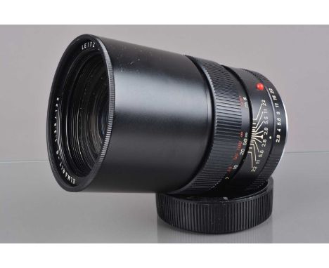 A Leitz Wetzlar 135mm f/2.8 Elmarit-R Lens, serial no 2041449, 1964, 1 cam, barrel G-VG, elements G-VG, with front and rear c