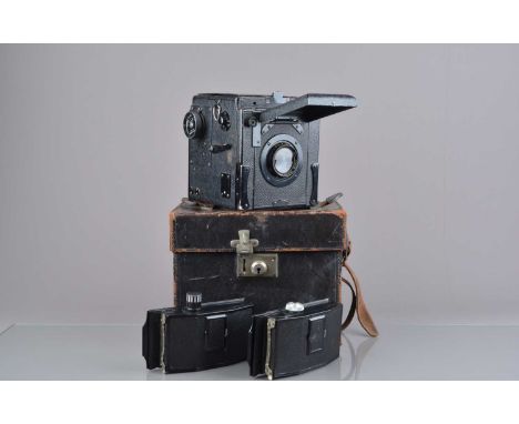 SALEROOM ANNOUNCEMENT - ROLL FIMBACKS ARE A DIFFERENT FORMAT TO THE CAMERAAn Ensign Special Reflex Camera, shutter mechanism 