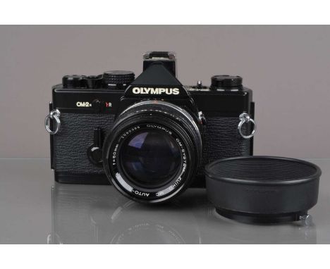 An Olympus OM-2n MD SLR Camera, black, serial no 1041501, shutter working, meter responsive, self-timer working, body G-VG, s