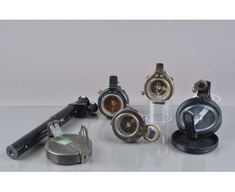 Early 20th Century  Compasses, Military-Pattern Marching Compasses, in leather cases (3) and Prismatic Surveying Compass, in 