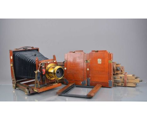 A Thornton-Pickard Mahogany and Brass 5 x 4 Triple Imperial Extension Field Camera, serial no 6991, body G, some wear and age