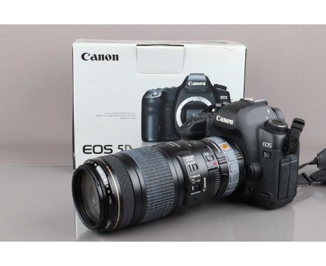 A Canon EOS 5D Mark II Camera, powers up, shutter working, appears to function as should, body G, light wear, with battery, n