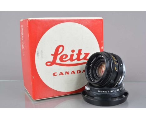 A Leitz Canada 35mm f/2 Summicron M Lens,  11 309, serial no 2484251, 1971, barrel VG, elements VG, with front/rear caps, 125
