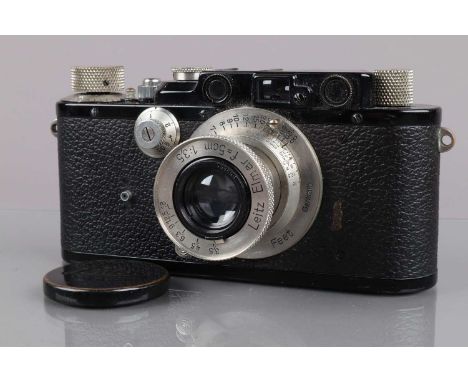 A Leica III Camera, black, serial no 194562, 1936, shutter working, rangefinder working, body G, sync socket conversion below