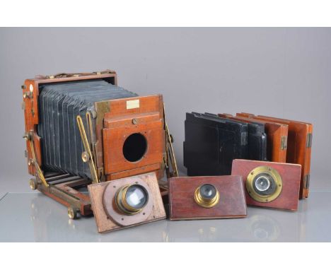 A Houghton Sanderson Mahogany and Brass Half Plate 'Regular Model' Field Camera,  with two dds, and two other dds, F, well us